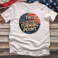 This is the Turning Point 3 Tee