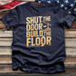 Shut the Door Build the Floor Tee